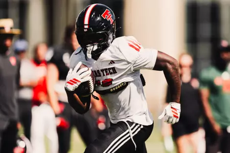 Rowden running downfield with the ball.