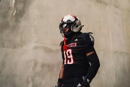 Wyatt walks down the tunnel before taking the field for a scrimmage