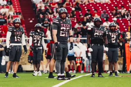 Adam Trick listening for a play call.