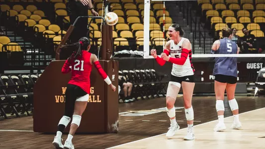 Elia Dinsmore and Emily Contreras celebrating a point for Texas Tech against St. Thomas