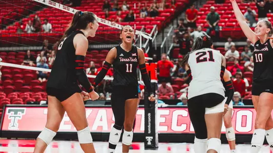 Tatum Johnson celebrating a point with her team against UTRGV