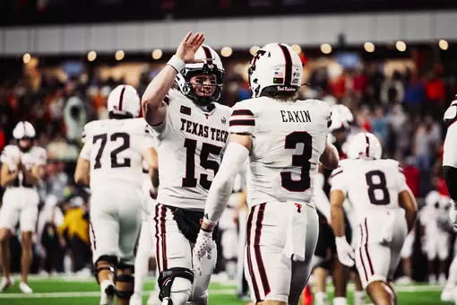 Will Hammond celebrating with Coy Eakin after throwing him a touchdown