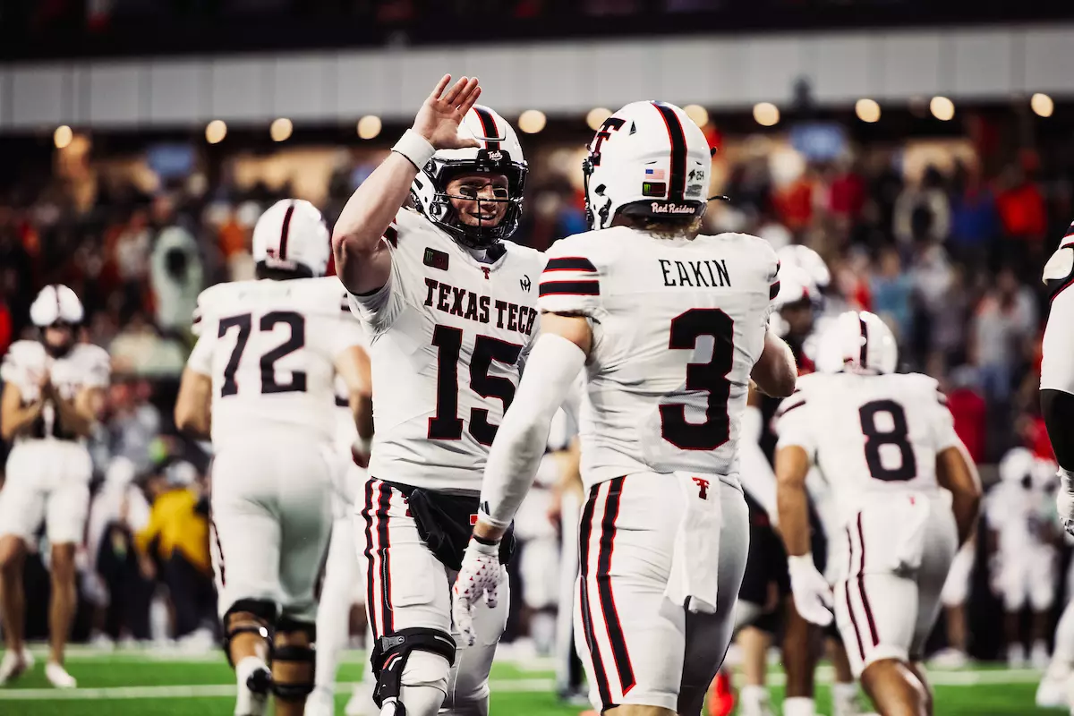 Will Hammond celebrating with Coy Eakin after throwing him a touchdown