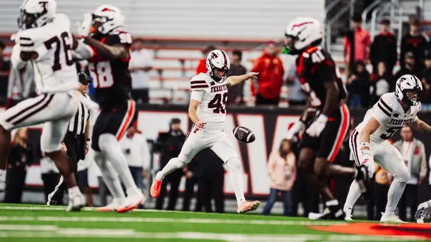 Will Karoll prepares for a punt as the offensive line blocks in front of him during Texas Tech's road win at Oregon State.