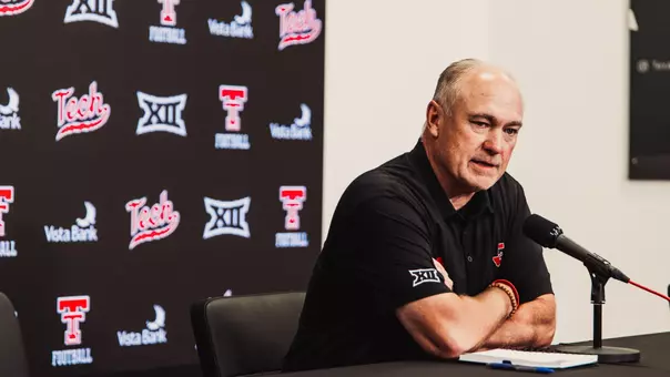 Joey McGuire speaks to the media as part of his weekly press conference during the 2026 season.