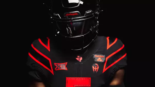 Photo of a model wearing Texas Tech's "Let's Ride" uniform featuring the State Farm logo.