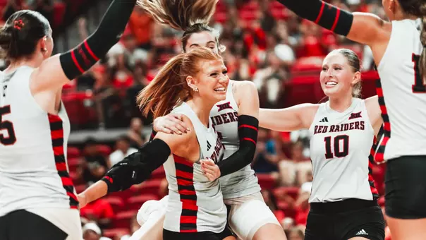 Shelby Ignash celebrating a point with her team