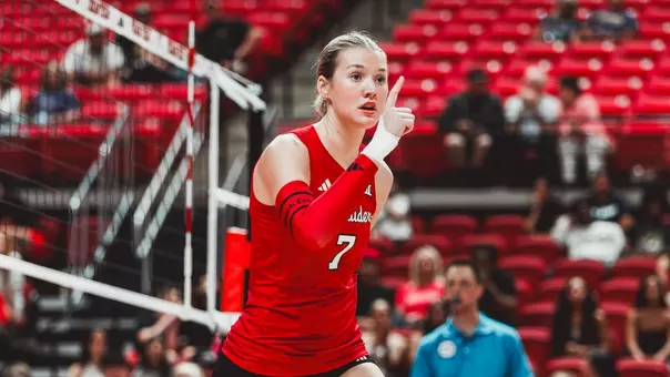 Kayla Robertson points after scoring a point for Texas TEch