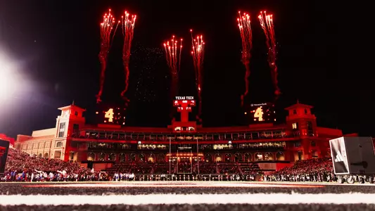 Fireworks shoot into the air over the South End Zone Building of Galaxy Stadium during Texas Tech's 2025 victory over Kansas.