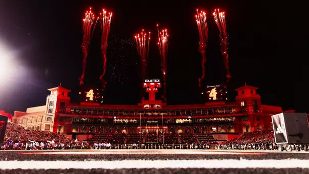 Fireworks shoot into the air over the South End Zone Building of Galaxy Stadium during Texas Tech's 2025 victory over Kansas.