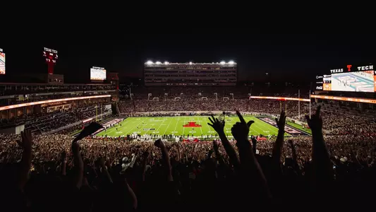Fans react in celebration during Texas Tech's victory over Houston as part of a sellout crowd at Galaxy Stadium.