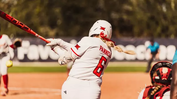 Taylor Pannell swinging her bat for Texas Tech softball