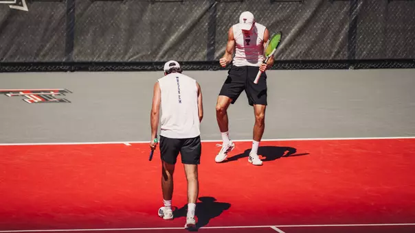 Arsic/Guglieri Celebrate Doubles Point