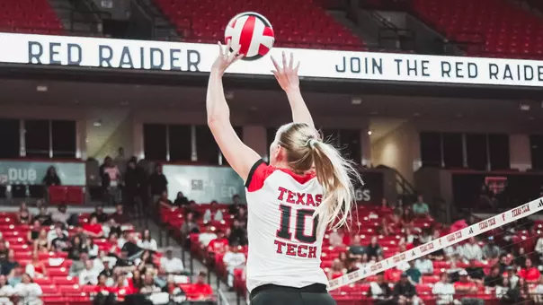 Katelyn Cochran setting a ball for Texas Tech volleyball against Iowa State
