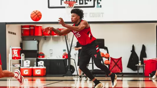 Jamichael Stillwell pushes the ball up the court during a Texas Tech practice.