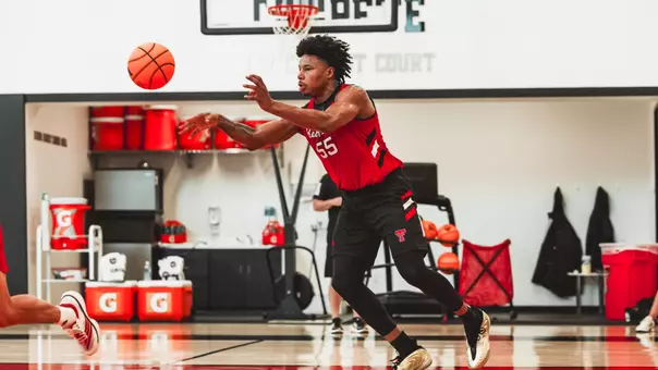 Jamichael Stillwell pushes the ball up the court during a Texas Tech practice.