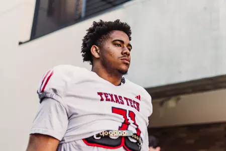 Bryce Gilmore walking down the tunnel for the scrimmage.