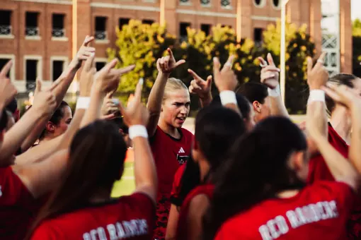 Texas Tech huddles prior to its contest at SMU