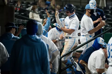 dugout after scoring