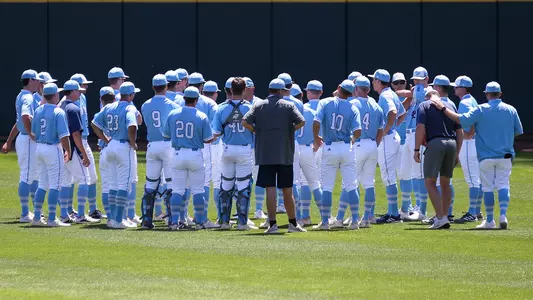 Postgame huddle at Samford