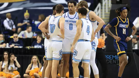 huddle at UNCG