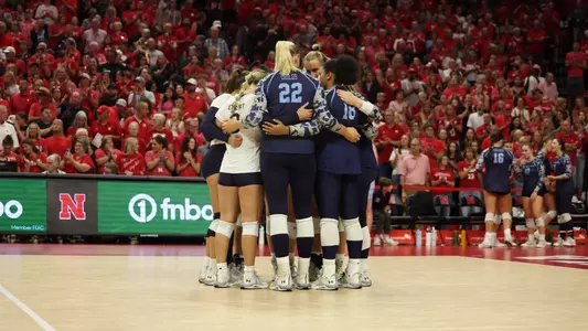 Team huddle vs. Nebraska
