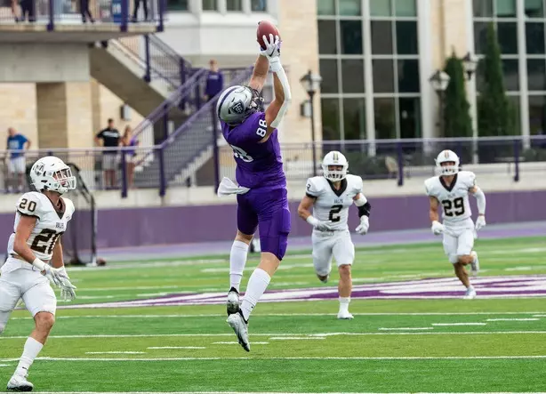 Aiden Carlson catches a pass during the Homecoming Football game against Valparaiso University in St. Paul on October 9, 2021.
