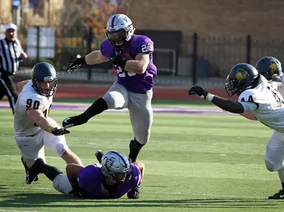 Football explodes in 2nd Q, secures MIAC crown Image