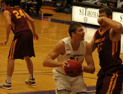 Hot shooting Men's Hoops opens with victory Image