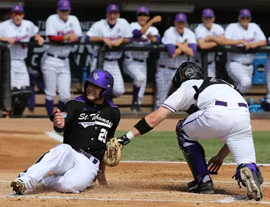 Baseball climbs in poll, adds road sweep Image