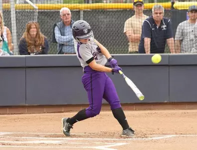 Gritty performance gives softball 9-5 win Image