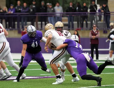 Takeaways, toughness lead Football Homecoming win Image