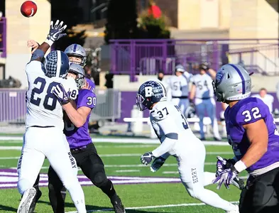 Football starts fast, outlasts tough Georgia foe Image