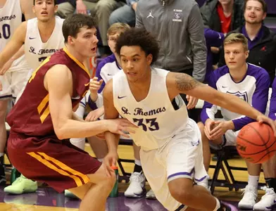 Men's Basketball starts slowly, surges past Cobbers Image