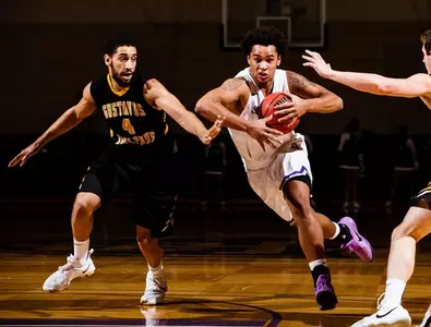 Home cooking vaults men's basketball to win Image