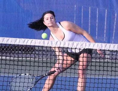 Women's Tennis now 9-0 with road victory Image