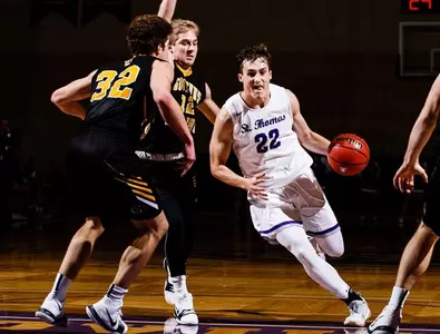 Men's basketball suffers heartbreaker in St. Peter Image