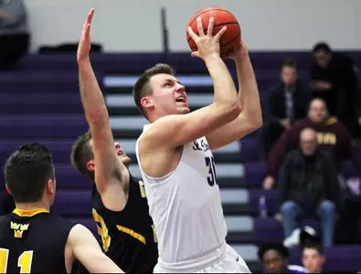 Record scoring gives men's basketball first win of 2018 Image