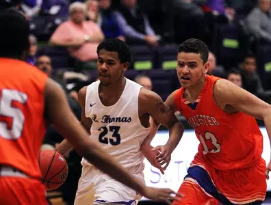 More records fall in men's basketball win Image