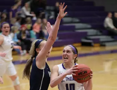 Women's Hoops tested by Royals, hangs on Image