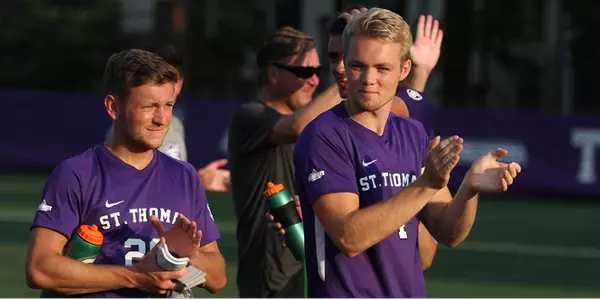 Josh Grzesiak (28) and Halvor Houg (4)