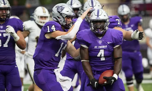 Hope Adebayo celebrates a big run during the Homecoming Football game against Valparaiso University in St. Paul on October 9, 2021.