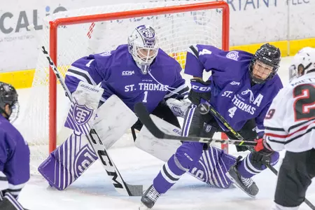 PETER THOME (St. Thomas-1 NOLAN SAWCHUK (St. Thomas-4) ) 2021 October 2 St. Cloud State University and St. Thomas meet in a non conference hockey game at the Herb Brooks National Hockey Center in St. Cloud, MN