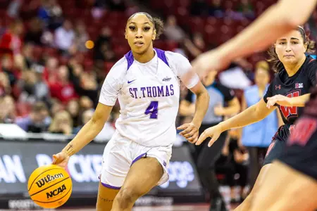 Madison, WI - Jade Hill (4) during a non-conference game against Wisconsin on Sunday, December 11, 2022. The Badgers defeated the Tommies 72-64. (Photo by Kodiak Creative/Jimmy Naprstek)