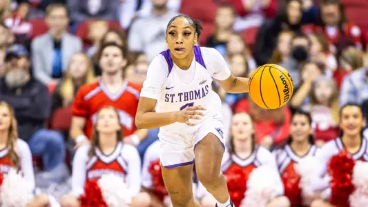 Madison, WI - Jade Hill (4) during a non-conference game against Wisconsin on Sunday, December 11, 2022. The Badgers defeated the Tommies 72-64. (Photo by Kodiak Creative/Jimmy Naprstek)