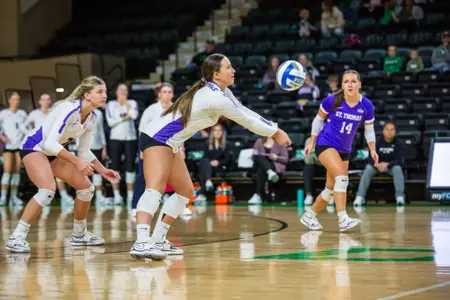 Allie Kopp receives a dig