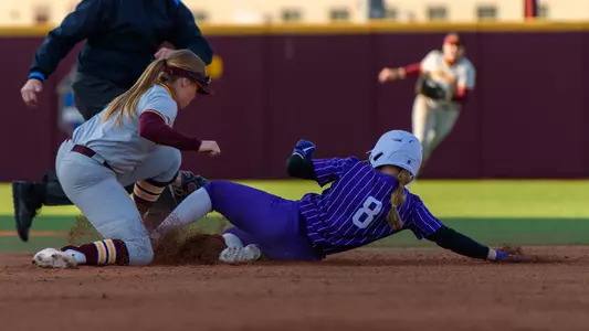 Brooke Betson slides in second base safely against Minnesota.