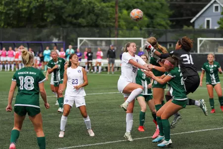in game photo from exhibition with Green Bay