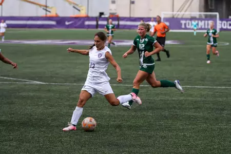in game photo from exhibition with Green Bay