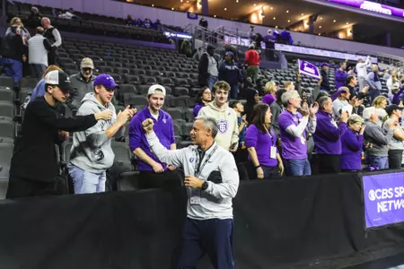 Phil Esten celebrates men's basketball win in the 2024-25 Summit League Tournament.